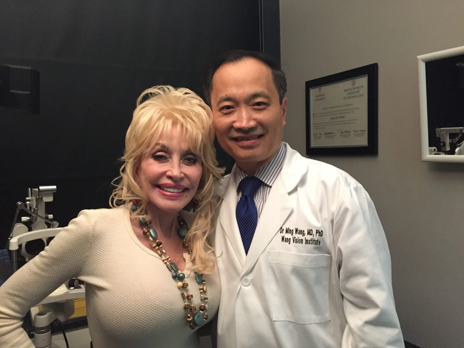 Dr. Ming Wang with patient
